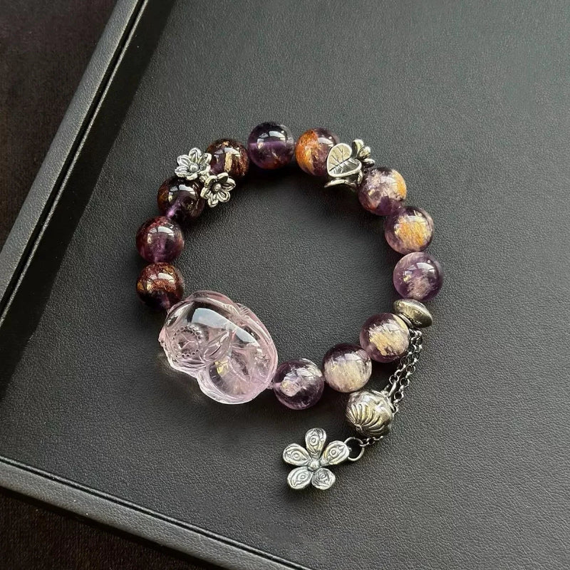 Healing crystal bracelet featuring Amethyst Fox and Phantom Amethyst – supports intuition, emotional healing, and spiritual protection.
