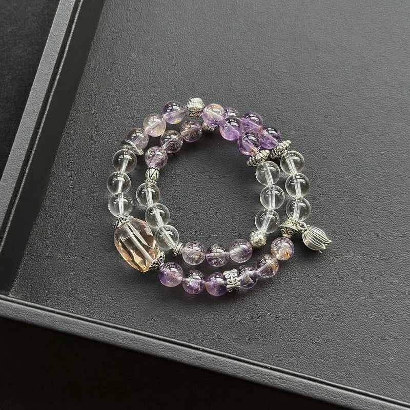 Healing crystal bracelet featuring Ametrine, Super Seven with Herkimer, and Clear Quartz – supports clarity, manifestation, and spiritual alignment.