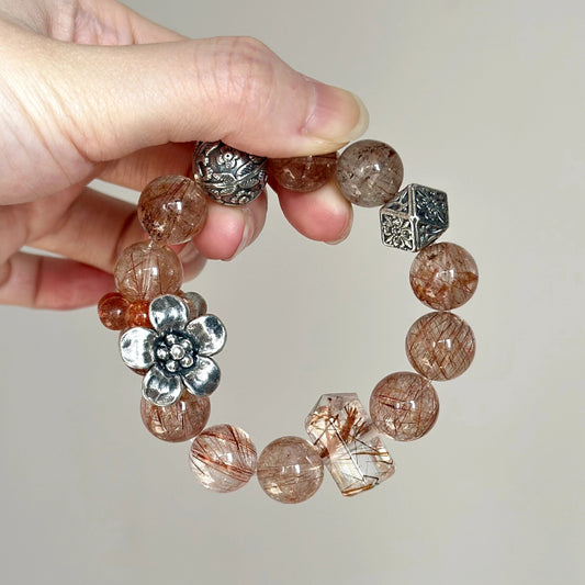 Beaded crystal bracelet with Arusha and Copper Rutilated Quartz – designed for positive energy, motivation, and self-confidence.