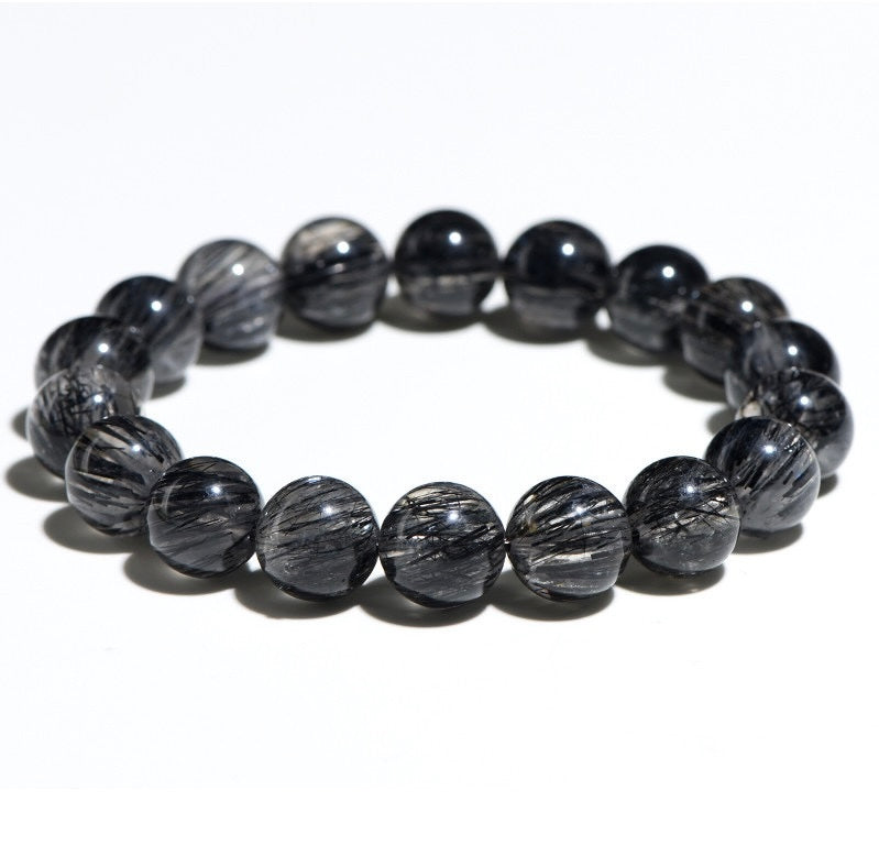 Aura Verse black rutilated quartz bracelet for women seeking healing, intention setting and clarity.