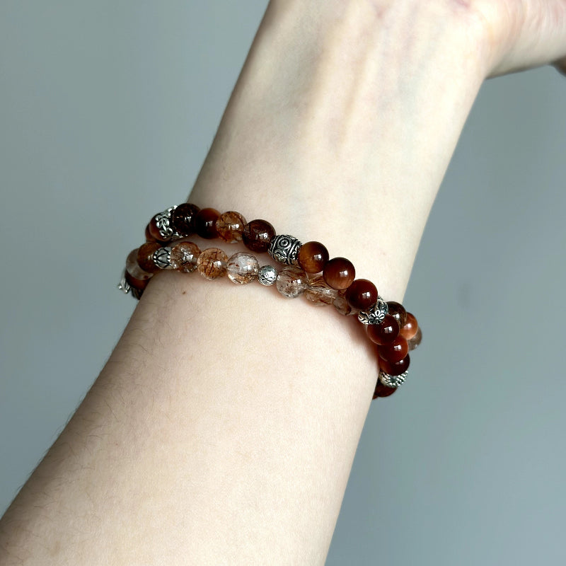 Powerful beaded bracelet featuring Black-Gold Super Seven and Copper Rutilated Quartz – handmade crystal jewelry for strength and protection.