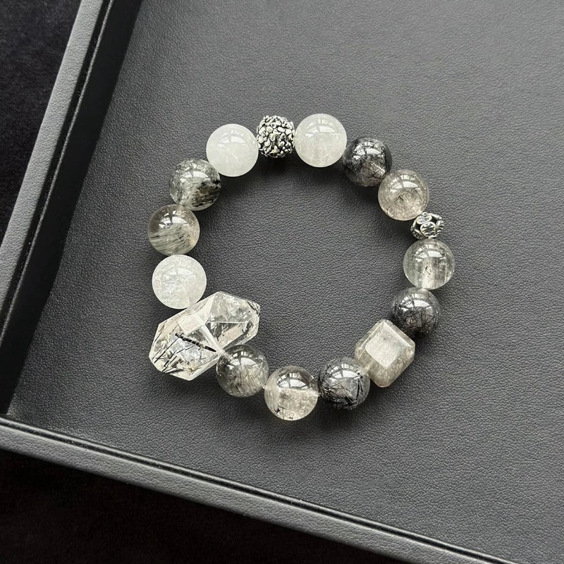 Healing crystal bracelet featuring Black Rutilated Phantom Quartz and Blue-Grey Rabbit Hair Phantom – supports grounding, clarity, and emotional transformation.