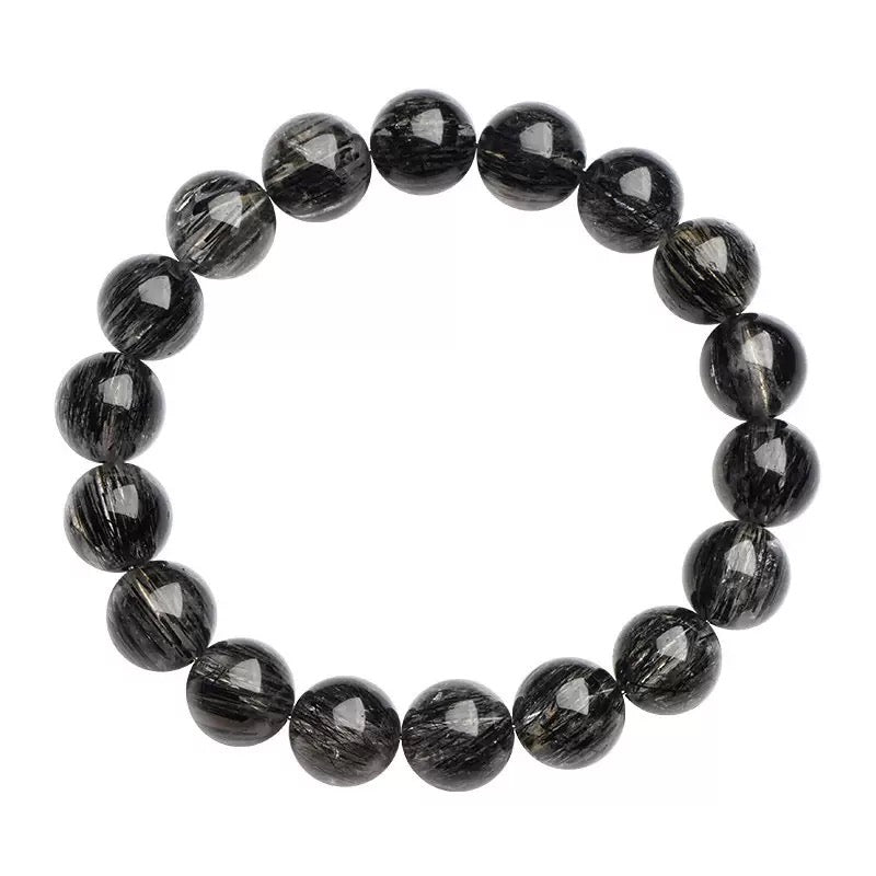 Black Rutilated Quartz Bracelet by Aura Verse, a handmade gemstone bracelet for love and healing.