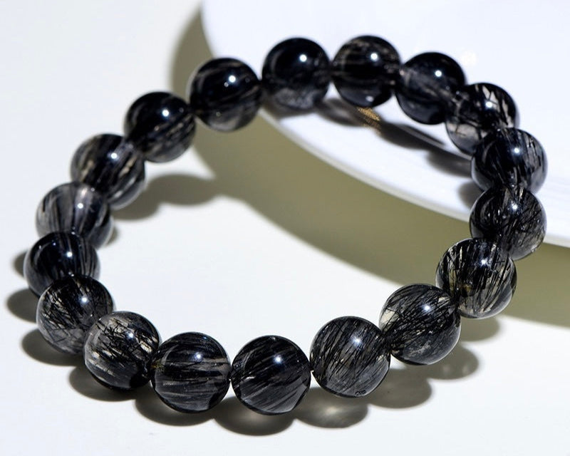 Crystal bead bracelet with Black Rutilated Quartz – powerful healing crystal for mental focus and protection