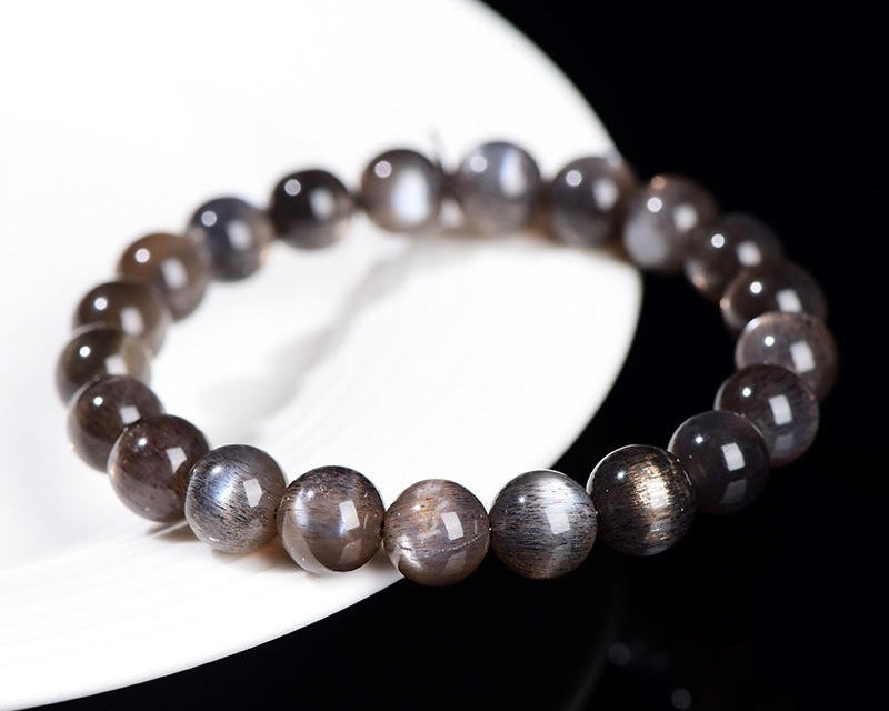 Black Skeletal Sunstone crystal bracelet enhancing protection and grounding