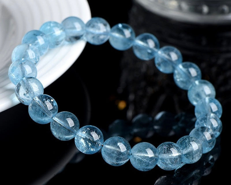 Bracelet with crystal beads – blue topaz for confidence and throat chakra healing