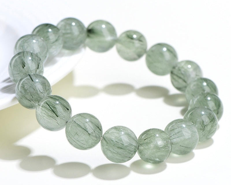 Bracelet with crystal beads – light green rutilated quartz for manifestation and peace