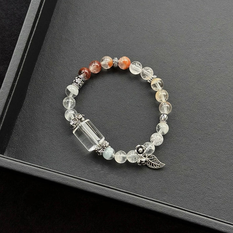 Healing crystal bracelet featuring Clear Quartz and Rabbit Hair Quartz – supports clarity, emotional healing, and gentle energy flow.