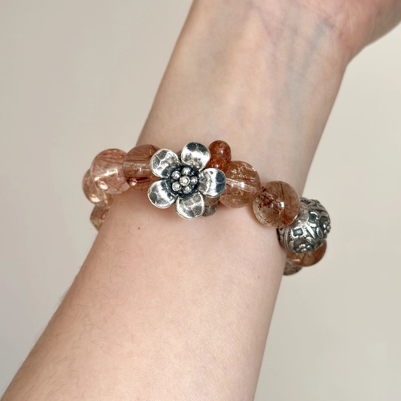Sterling silver beaded bracelet with Copper Rutilated Quartz and Arusha – handmade crystal jewelry for strength and spiritual growth.