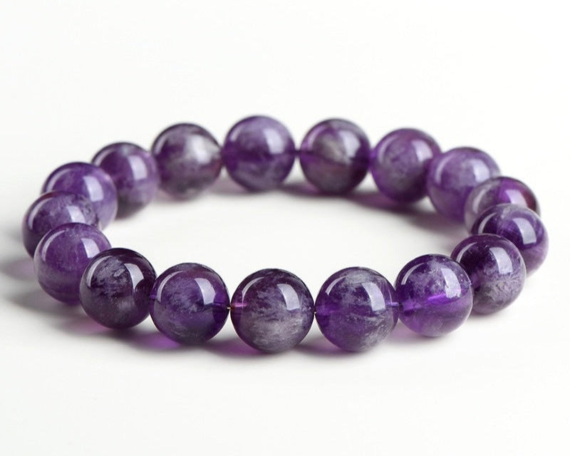 Stretchy Feather Amethyst crystal bead bracelet promoting emotional healing and calm