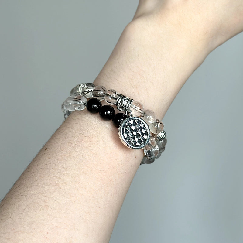 Energy crystal bracelet featuring Frost Rutilated Quartz and Black Agate – enhances grounding, emotional control, and confidence.