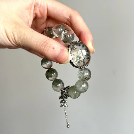 Beaded crystal bracelet with Green Garden Phantom and Clear Quartz – perfect for healing, growth, and spiritual focus.