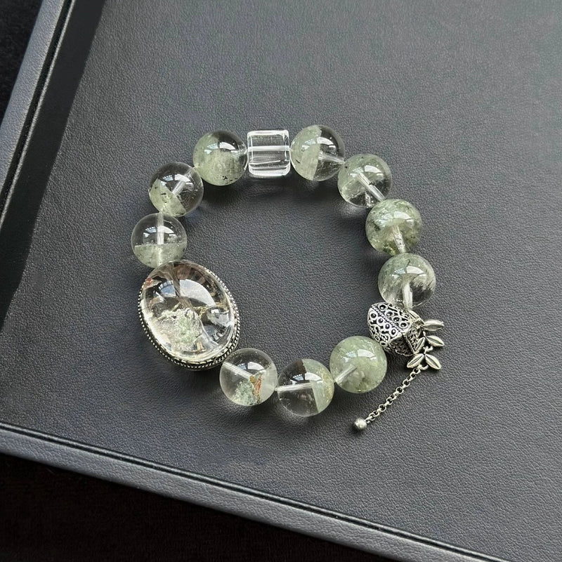 Healing crystal bracelet featuring Green Garden Phantom and Clear Quartz – supports grounding, clarity, and heart chakra energy.