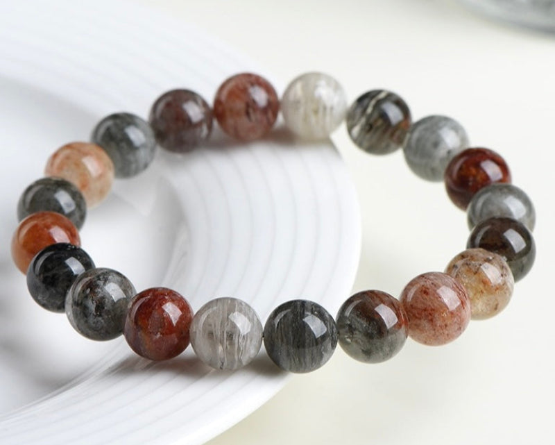 Healing crystal bracelet – dark rainbow phantom quartz for inner growth and calm