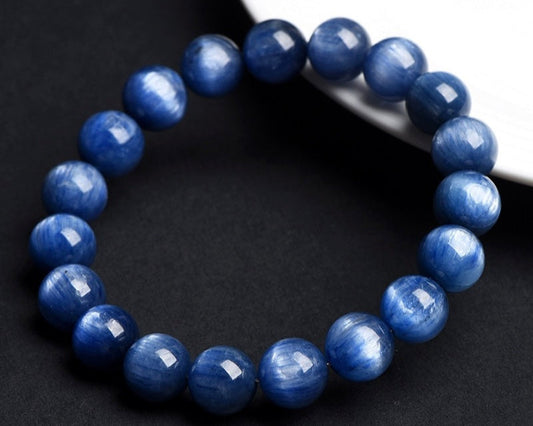 Healing crystal bracelet featuring Cat’s Eye Kyanite for protection and anxiety relief