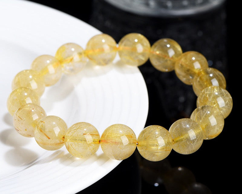 Healing crystal bracelet – golden rutilated quartz for focus, wealth, and balance