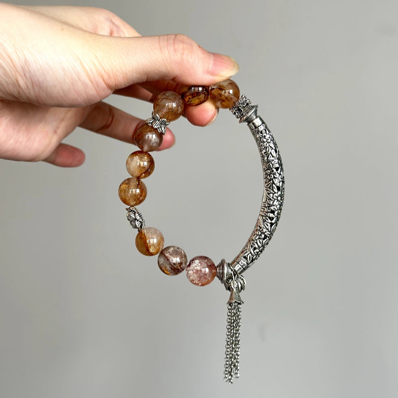 Crystal healing bracelet with Hematoid Quartz and Copper Rutilated Quartz – promotes focus, energy flow, and manifestation power.