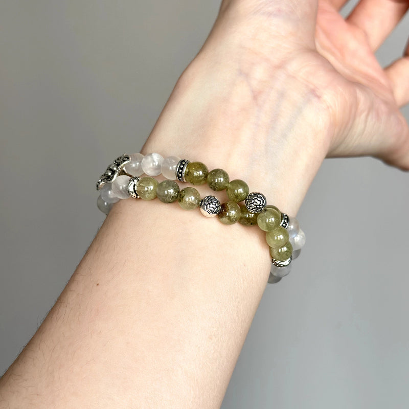 Elegant beaded bracelet with Green Jade barrel, Tsavorite, and Blue Moonstone – healing jewelry for emotional clarity and peace.