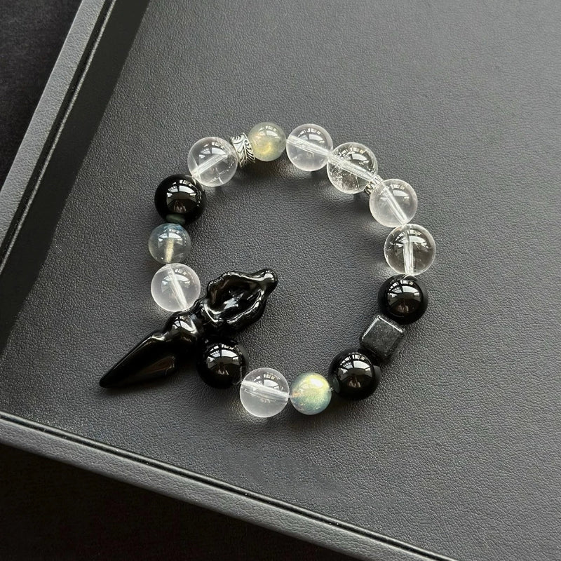 Healing crystal bracelet featuring Obsidian Vajra, Grey Moonstone, and Clear Quartz – ideal for protection, balance, and energy clarity.