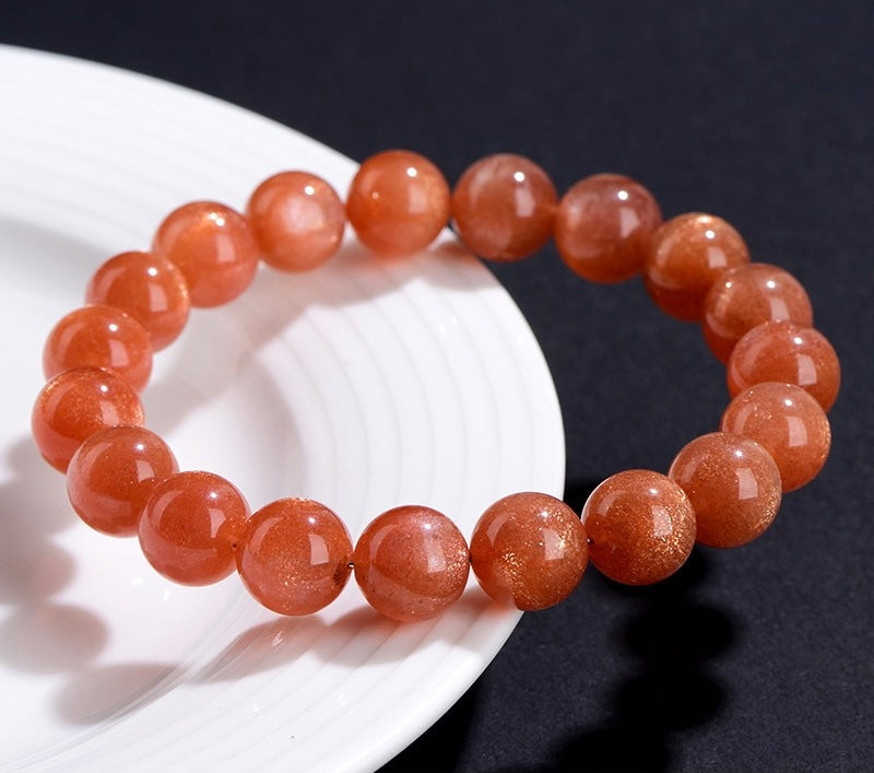 Flexible stretch fit Orange Moonstone crystal bracelet for women