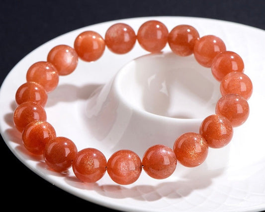 Healing crystal jewelry with orange moonstone – emotional balance and creativity