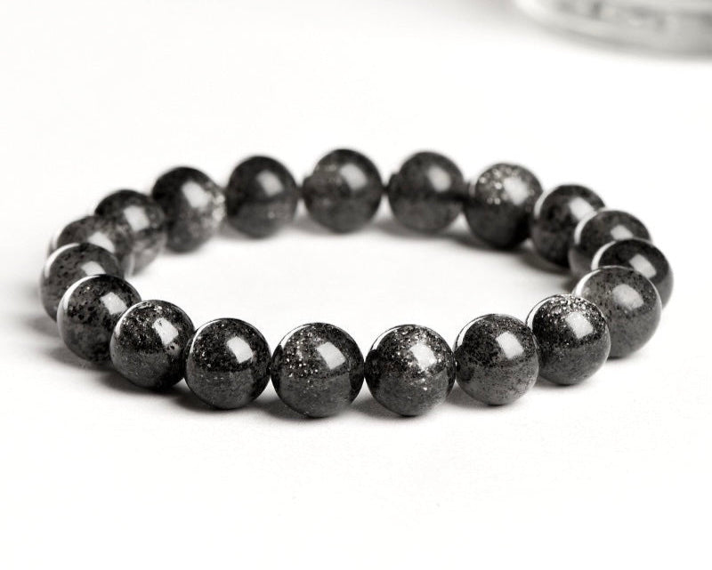 Protective black crystal bracelet for men and women with sunstone