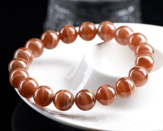 Beaded healing crystal bracelet for women made with natural rhodochrosite