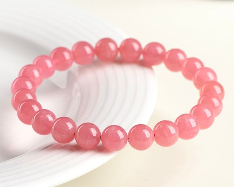 Self-love crystal bracelet made of Rhodochrosite – powerful pink stone for healing and heart chakra energy