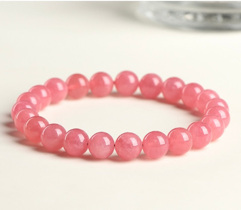 Rhodonite Bracelet for compassion and emotional release, by Aura Verse.