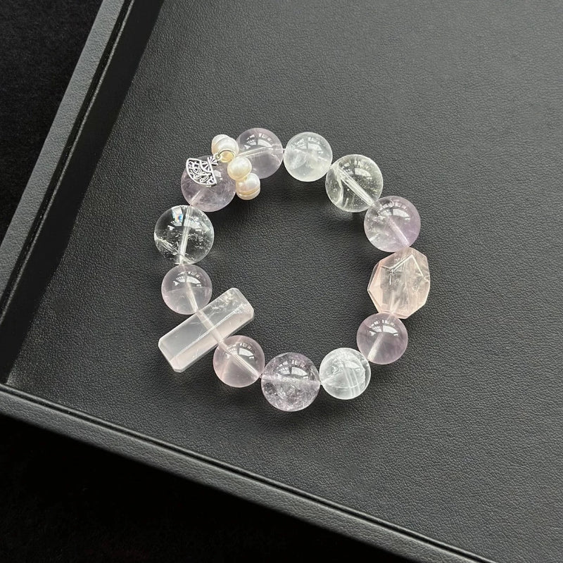 Healing crystal bracelet featuring Rose Quartz, Amethyst, White Azeztulite, and Rabbit Hair Quartz – supports love, spiritual clarity, and emotional balance.