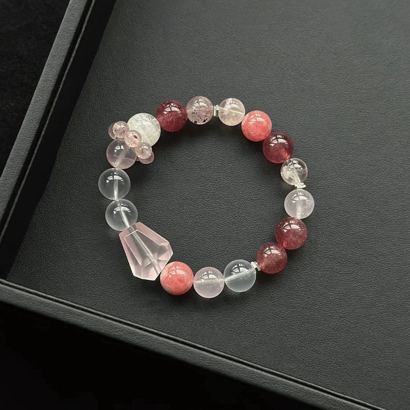 Healing crystal bracelet featuring Rose Quartz, Snowflake Phantom, Strawberry Quartz, and Rhodochrosite – supports love, emotional healing, and self-worth.
