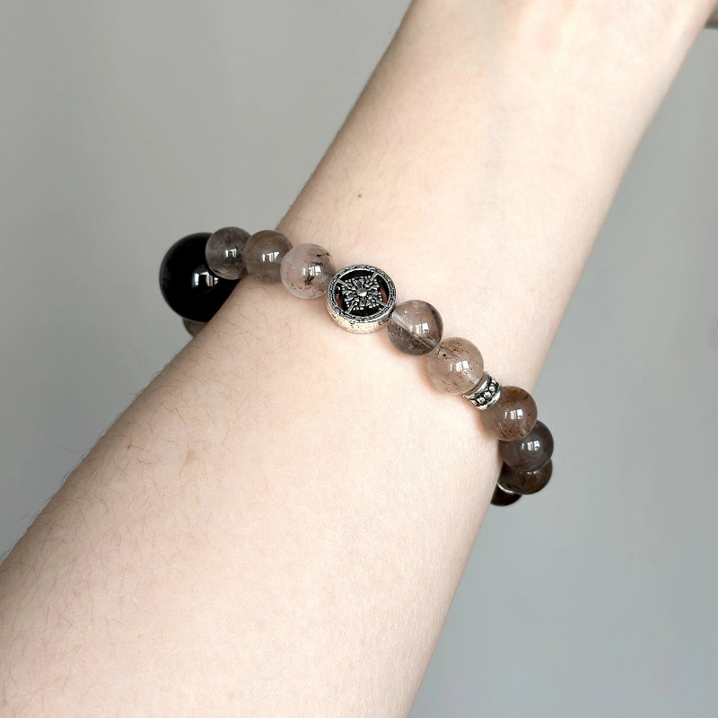 Beaded crystal bracelet with healing gemstones – Smoky Quartz and Super Seven for anxiety relief and balance.
