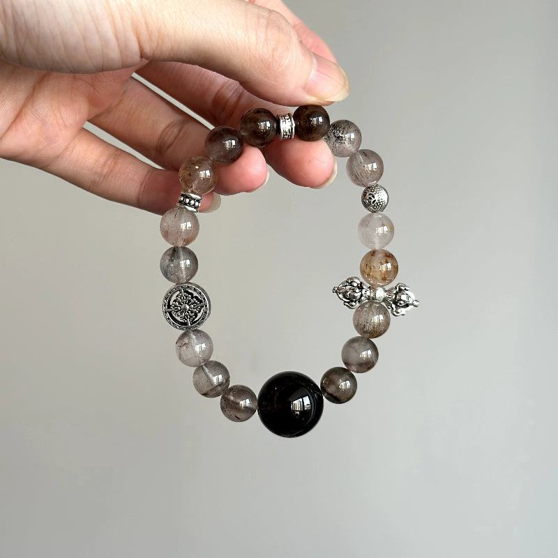 Women's beaded bracelet with Smoky Quartz and Super Seven – healing stones for strength and calmness.