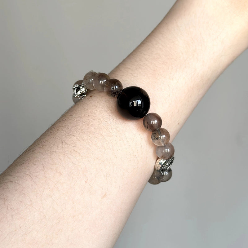 Energy crystal bracelet combining Smoky Quartz and Super Seven – great for grounding and energy protection.