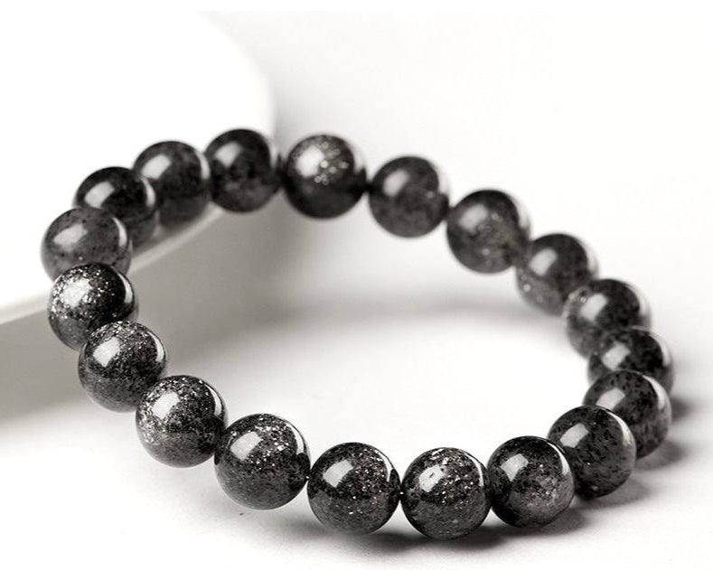 Stretchy crystal bead jewelry bracelet featuring black sunstone beads