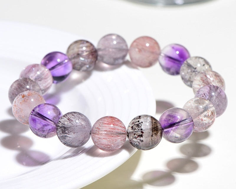 Super Seven beaded crystal bracelet – energy stone jewelry for anxiety relief, grounding, and balance