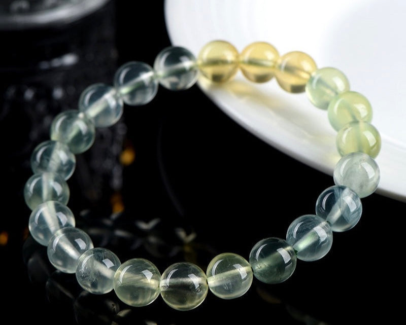 Unique handmade Gradient Prehnite crystal bracelet promoting renewal and balance