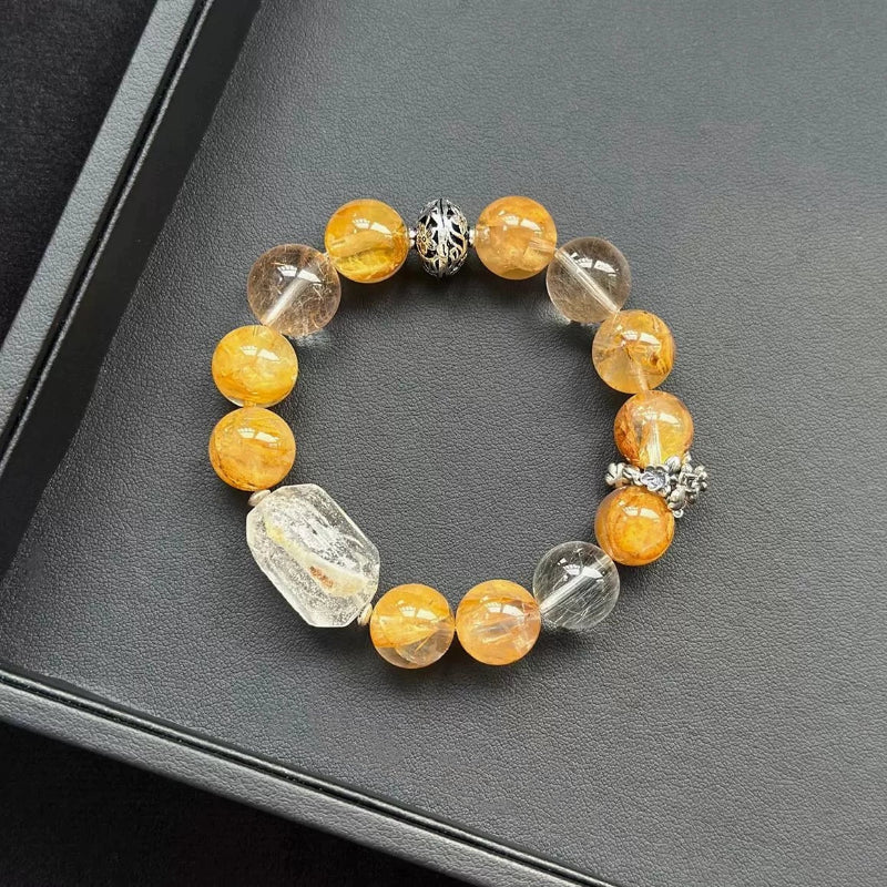 Healing crystal bracelet featuring White Phantom and Yellow Hematite Quartz, with Color Rabbit Hair crystals for focus and inner peace.