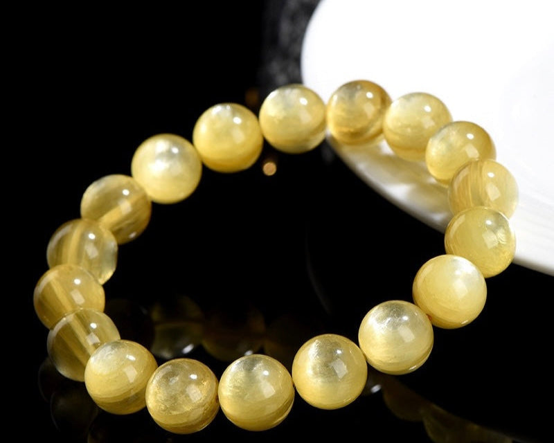 Yellow Lepidolite crystal bracelet supporting wellness, calm, and stress relief