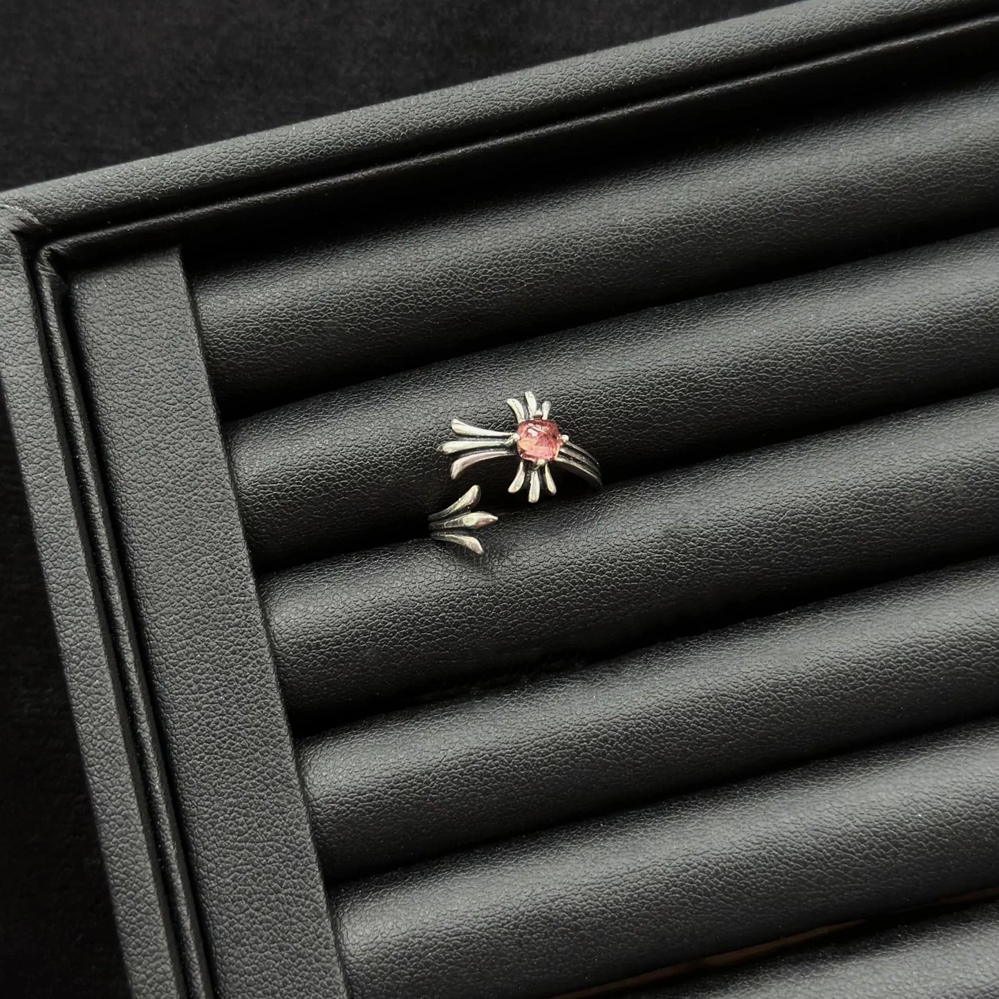 Pink Tourmaline Tanta Crystal Sterling Silver Ring on a black background