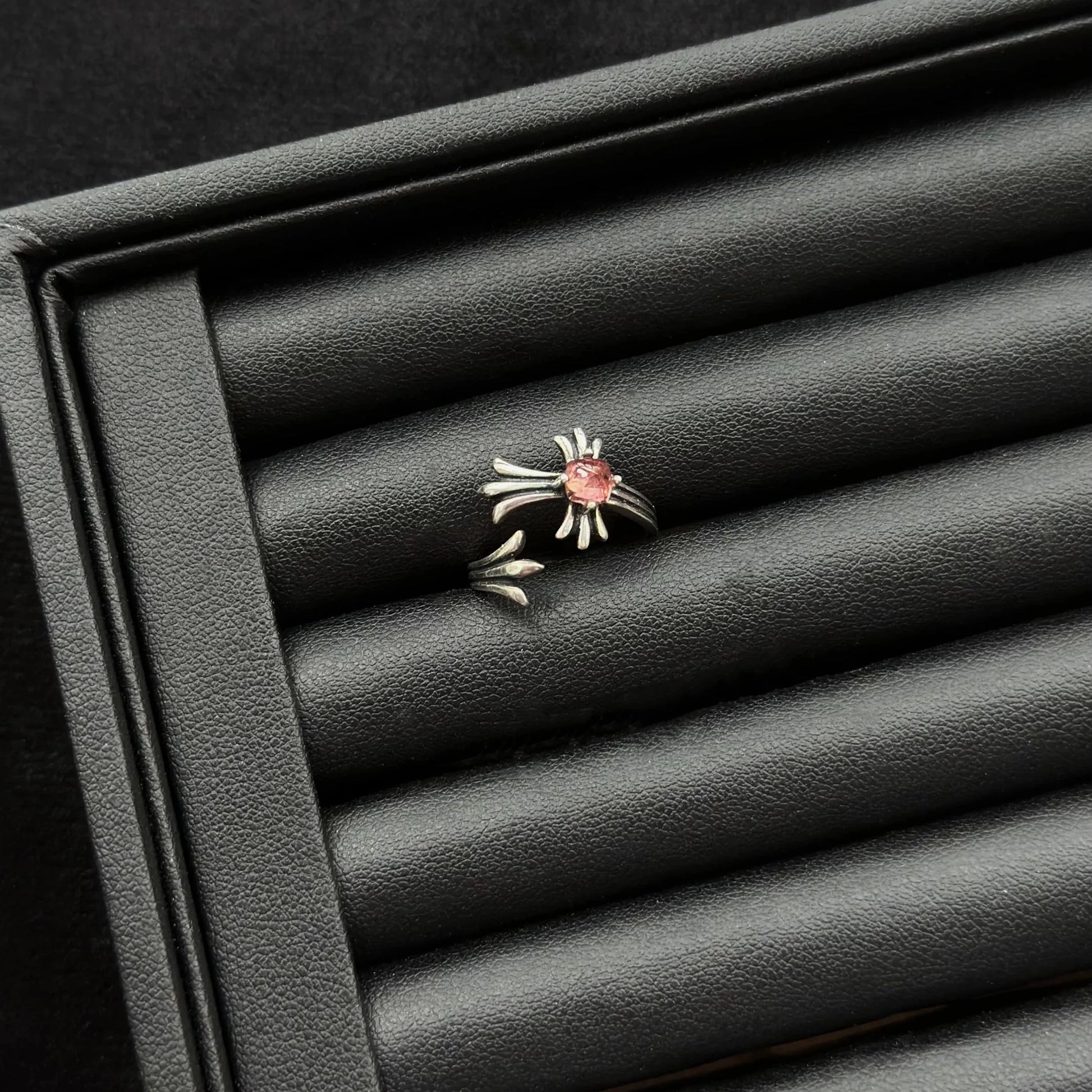 Pink Tourmaline Tanta Crystal Sterling Silver Ring on a black background