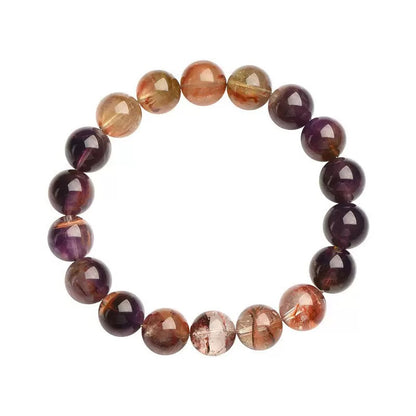 Auralite 23 crystal bracelet in purple and red tones for spiritual healing and protection