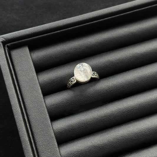 Snow Phantom Quartz Sterling Silver Ring in a black jewelry box