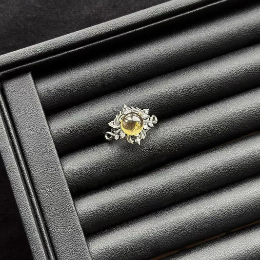 Vintage Citrine Sterling Silver Ring on a black leather surface