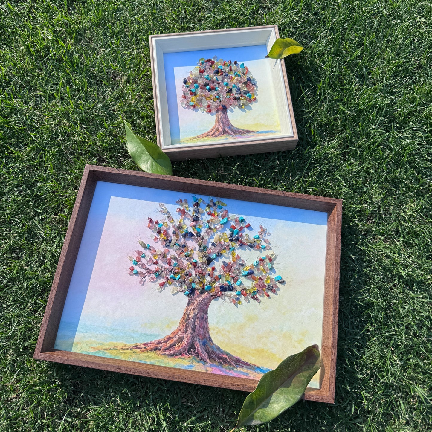 Lifestyle shot of Tree of Life crystal art showing the scale of A4 and square sizes.