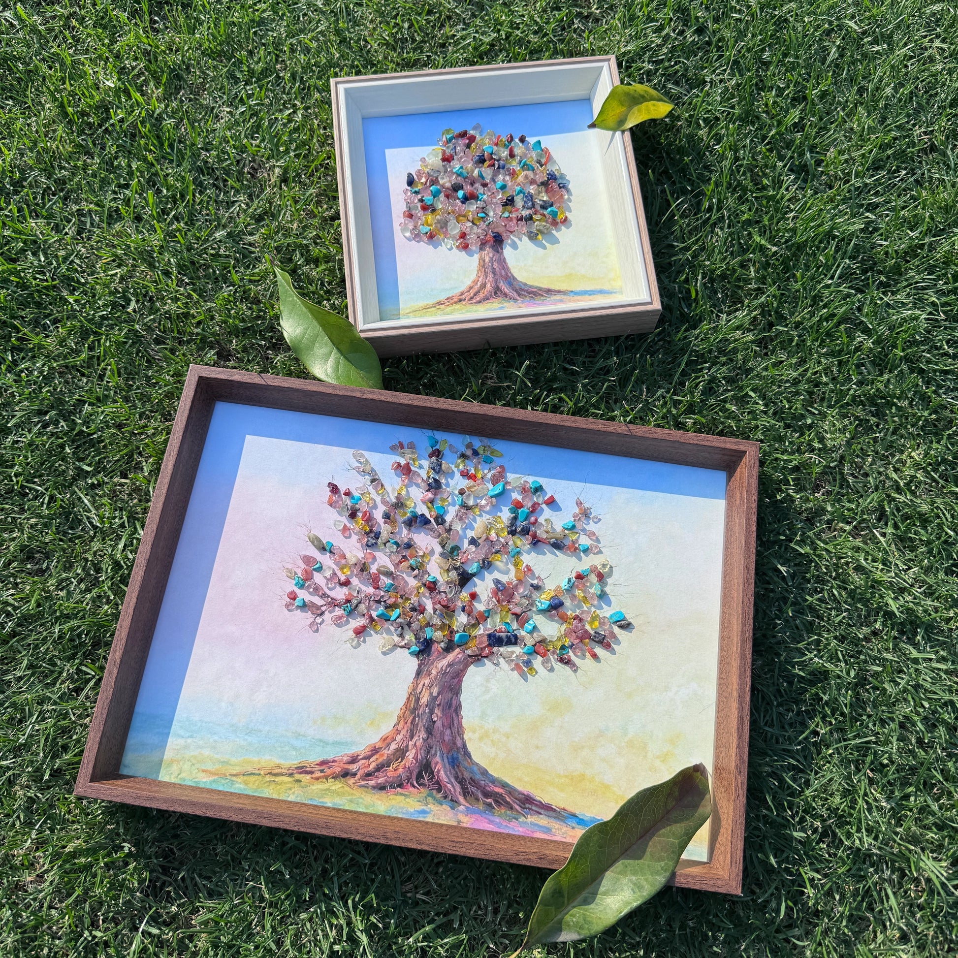 Lifestyle shot of Tree of Life crystal art showing the scale of A4 and square sizes.