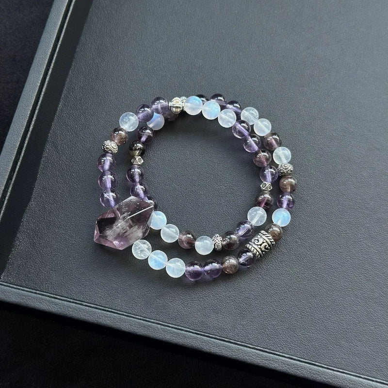 Healing crystal bracelet featuring Amethyst Phantom, Blue Moonstone, and Auralite 23 – supports spiritual awakening, inner vision, and deep healing.