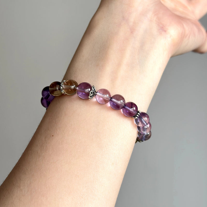 Energy crystal bracelet featuring Ametrine – enhances focus, aligns the solar plexus and crown chakras, and encourages transformation.