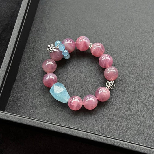 Healing crystal bracelet featuring Aquamarine and Rose Quartz – supports love, calm communication, and emotional healing.
