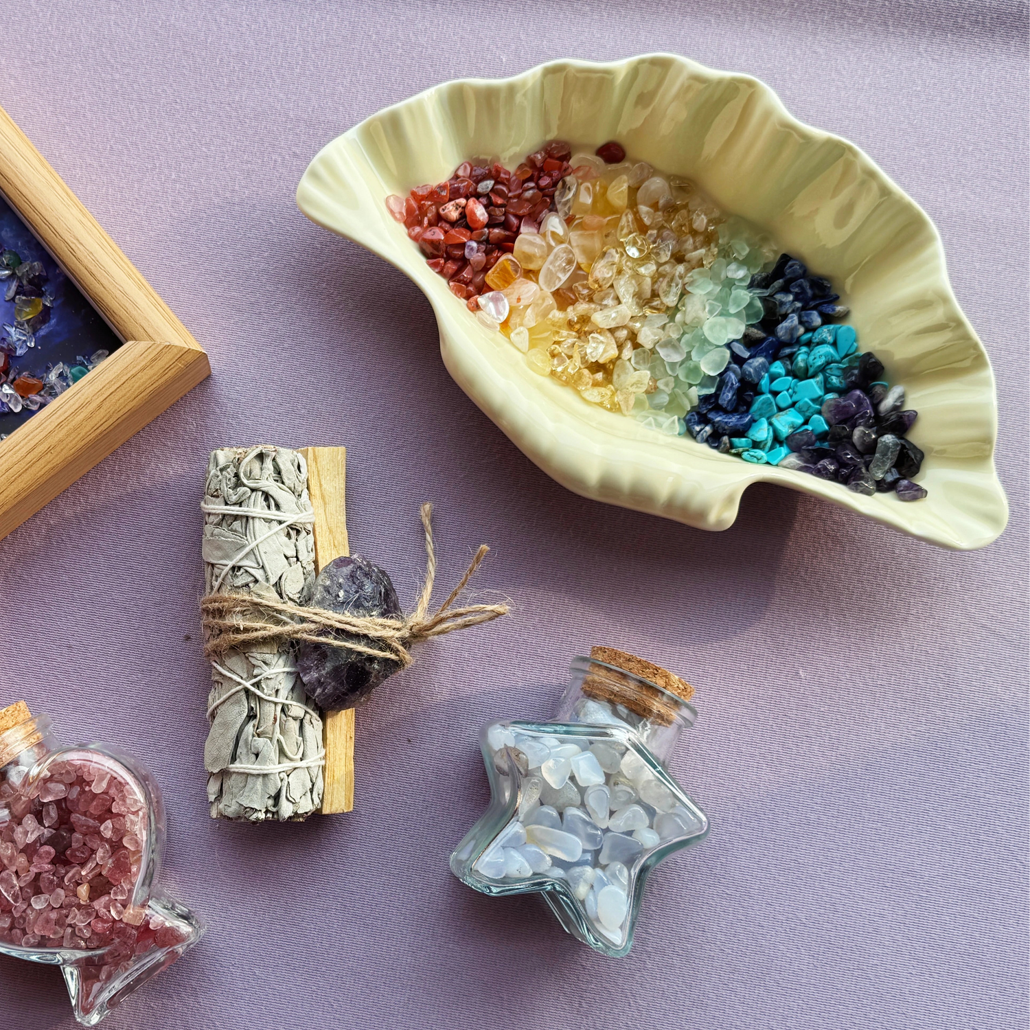 Close-up of the meticulous handcrafted process making unique gemstone decor using natural healing crystals and raw stone chips.